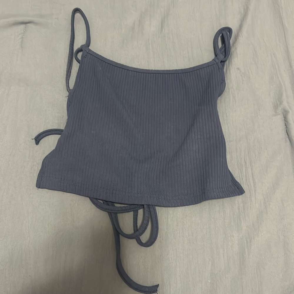 Blue tank with open back that ties